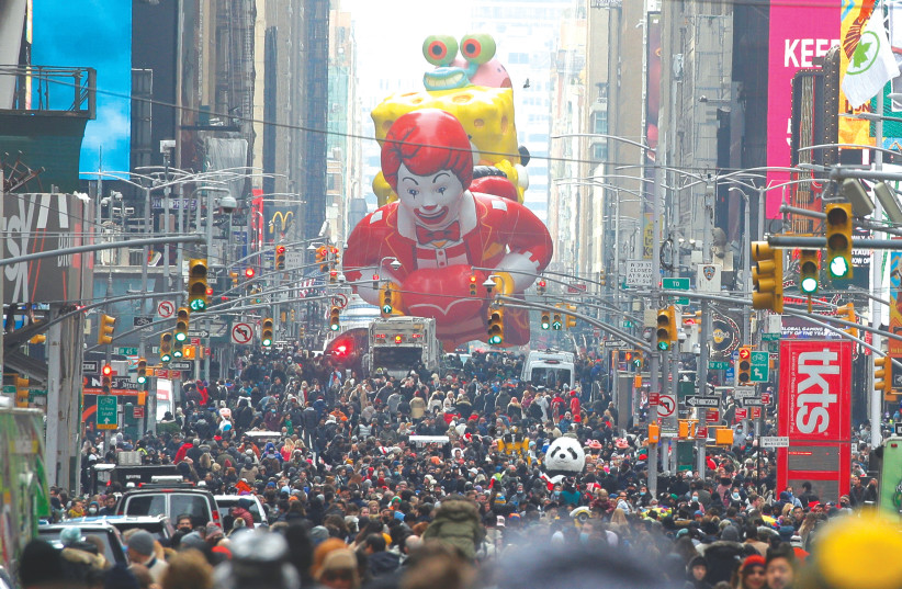  People attend the 95th Macy’s Thanksgiving Day Parade in Manhattan last year (credit: BRENDAN MCDERMID/REUTERS)