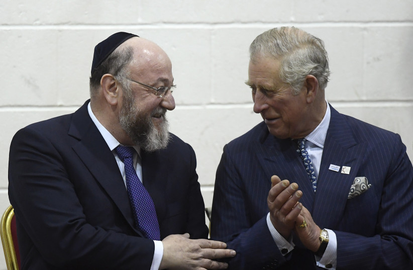  Britain's Prince Charles (R) speaks with chief rabbi Ephraim Mirvis during a visit to Yavneh College, an Orthodox Jewish School in north London, Britain, February 1, 2017. (photo credit: REUTERS/TOBY MELVILLE)