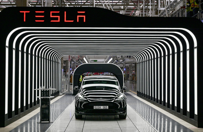   Model Y cars are pictured during the opening ceremony of the new Tesla Gigafactory for electric cars in Gruenheide, Germany, March 22, 2022. (credit: Patrick Pleul/Pool/REUTERS)
