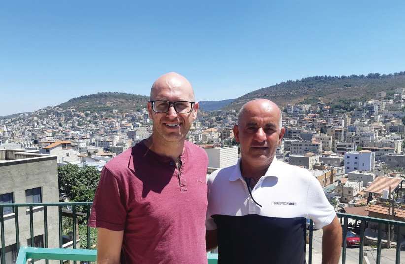  TEDDY FASSBERG (L) with Ali Galia, his Sakhnin benefactor.  (credit: Aviv Tessler)