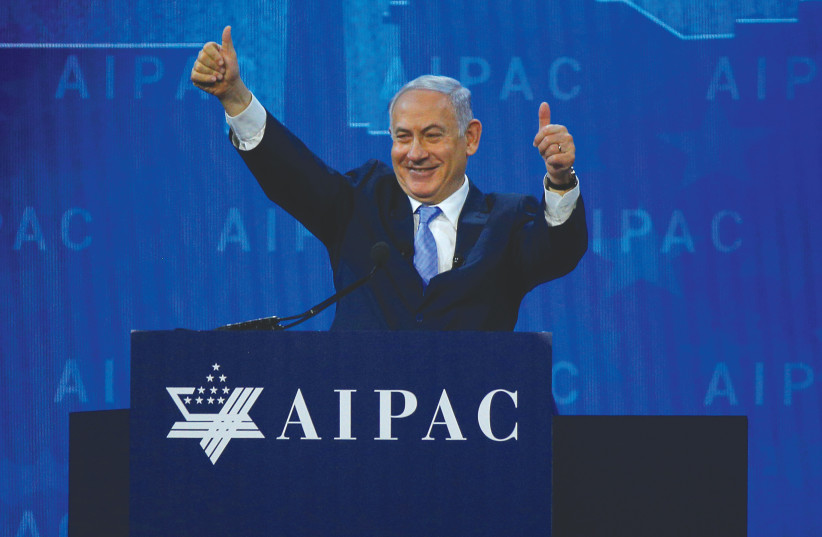  BENJAMIN NETANYAHU speaks at the AIPAC policy conference in Washington, in 2018. The Jewish community in America is a strategic asset for Israel, says the writer (photo credit: BRIAN SNYDER/REUTERS)