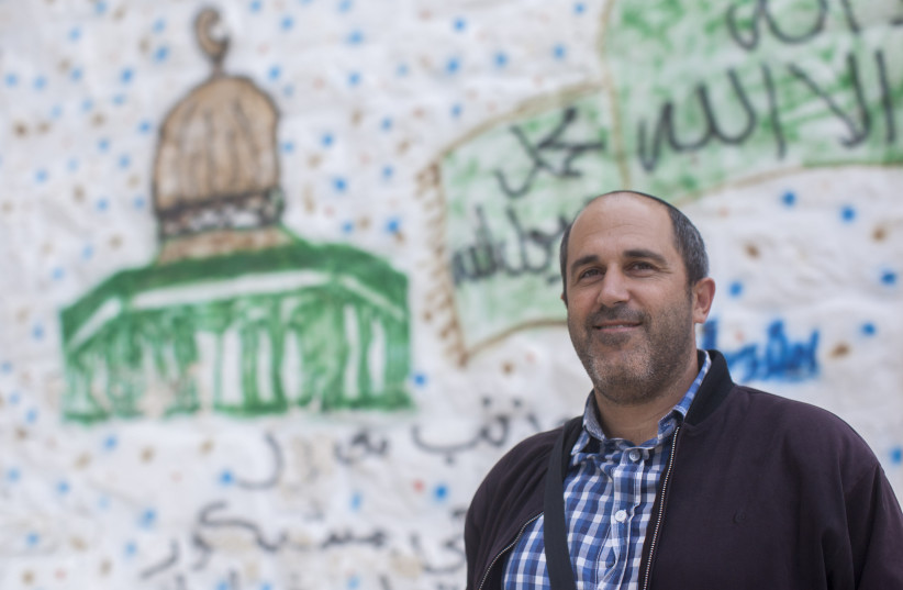 Jerusalem City Council member Aryeh King poses for a picture in the east Jerusalem neighborhood of Silwan, in Jerusalem on October 22, 2014 (photo credit: YONATAN SINDEL/FLASH90)