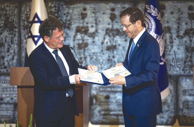  CHAIRMAN OF the Central Elections Committee and Supreme Court judge Yitzhak Amit presents the official results of the elections to President Isaac Herzog, at the President’s Residence on Wednesday.  (photo credit: YONATAN SINDEL/FLASH90)