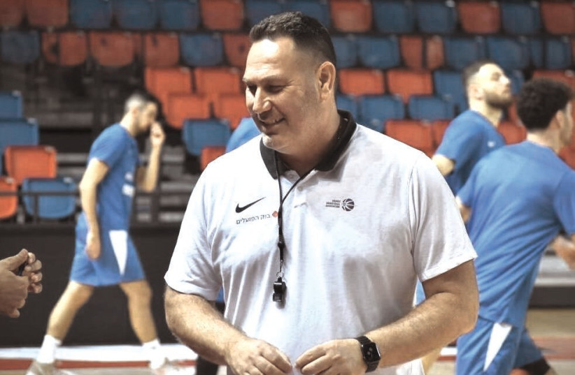   GUY GOODES shares a laugh at an Israel national team practice ahead of the blue-and-white’s pair of World Cup qualifiers this weekend, against Slovenia and Sweden (photo credit: JOSHUA HALICKMAN)