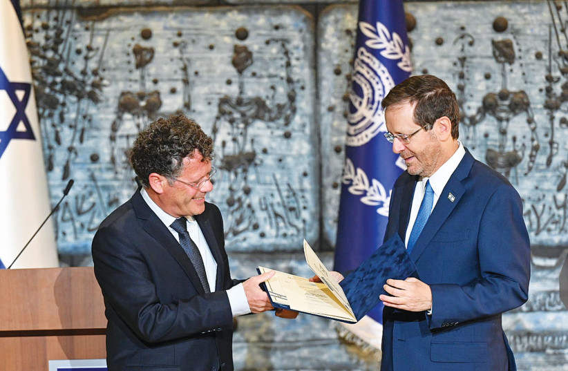  PRESIDENT ISAAC Herzog receives the official election results from Supreme Court Justice Yitzhak Amit, chairman of the Central Elections Committee, on Wednesday. Israel doesn’t need to make excuses for a normative democratic practice, says the writer (photo credit: KOBI GIDEON/GPO)