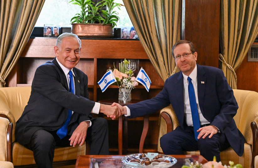  President Isaac Herzog meets with Likud leader Benjamin Netanyahu to grant him the mandate to form a government, November 13, 2022 (photo credit: KOBI GIDEON/GPO)