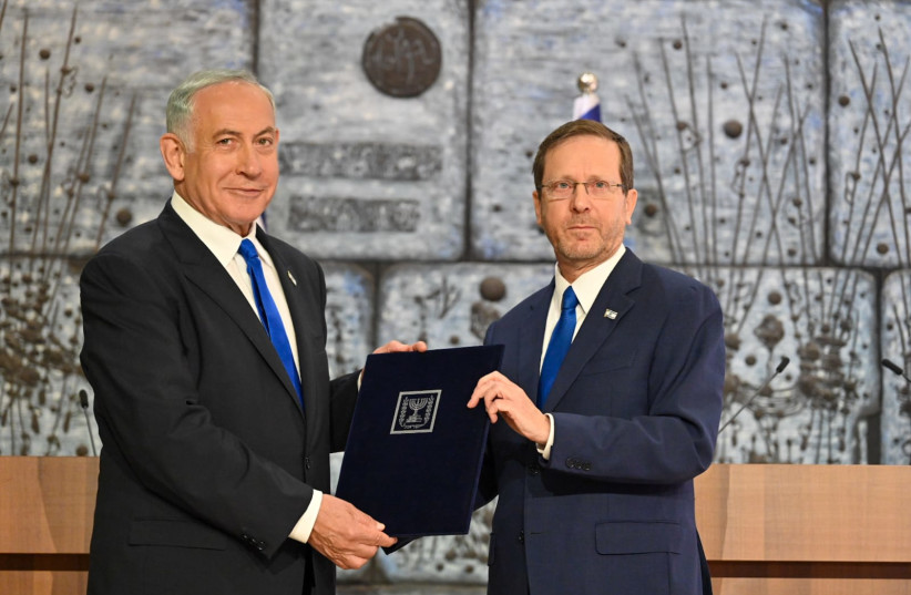 Incoming prime minister Benjamin Netanyahu receives mandate to form a government from President Isaac Herzog, November 13, 2022. (photo credit: KOBI GIDEON/GPO)