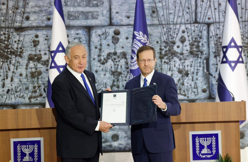  Incoming prime minister Benjamin Netanyahu receives mandate to form a government from President Isaac Herzog, November 13, 2022. (photo credit: MARC ISRAEL SELLEM/THE JERUSALEM POST)
