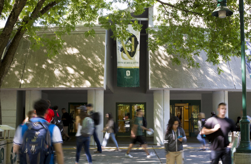  Students walk on Sacramento State campus. (photo credit: FLICKR.COM)