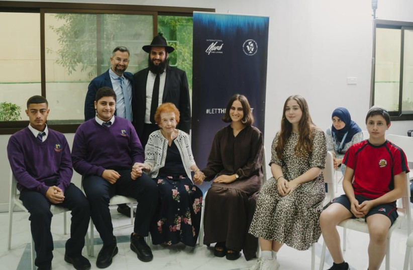  Eitan Neishlos, Rabbi Levi Duchman, Eve Kugler and young students  (credit:  2xceed)