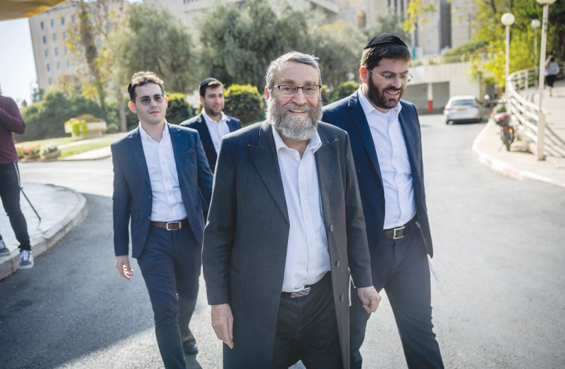  MK MOSHE GAFNI emerges from coalition talks at a hotel in Jerusalem, last week. ‘We are joining in order to implement policy and to do so we need the override clause,’ he said. (photo credit: YONATAN SINDEL/FLASH90)
