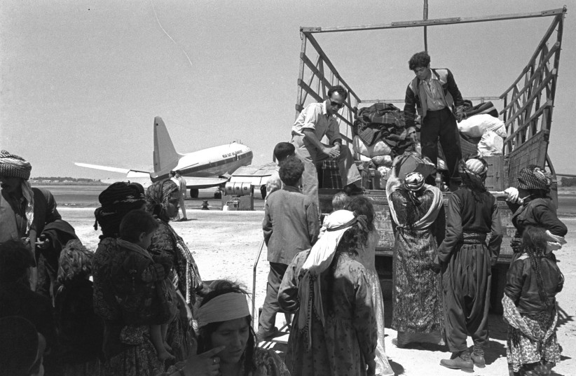  Jewish immigrants from Iraq at Lod Airport near Tel Aviv, 1951. (credit: ISRAELI GOVERNMENT PRESS OFFICE)