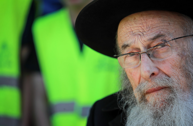  Rabbi Zvi Thau attends the "Yeshivot March" to call for the strengthening of Jewish identity in the State of Israel against the Conversion Law and Kashrut Law on January 30, 2022 in Jerusalem. (photo credit: OLIVIER FITOUSSI/FLASH90)