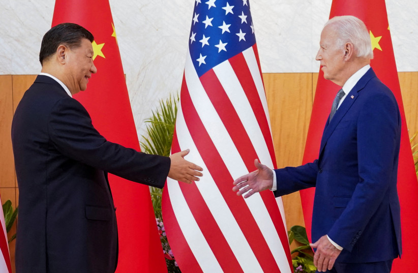  US President Joe Biden meets with Chinese President Xi Jinping on the sidelines of the G20 leaders' summit in Bali, Indonesia, November 14, 2022. (credit: REUTERS/KEVIN LAMARQUE)