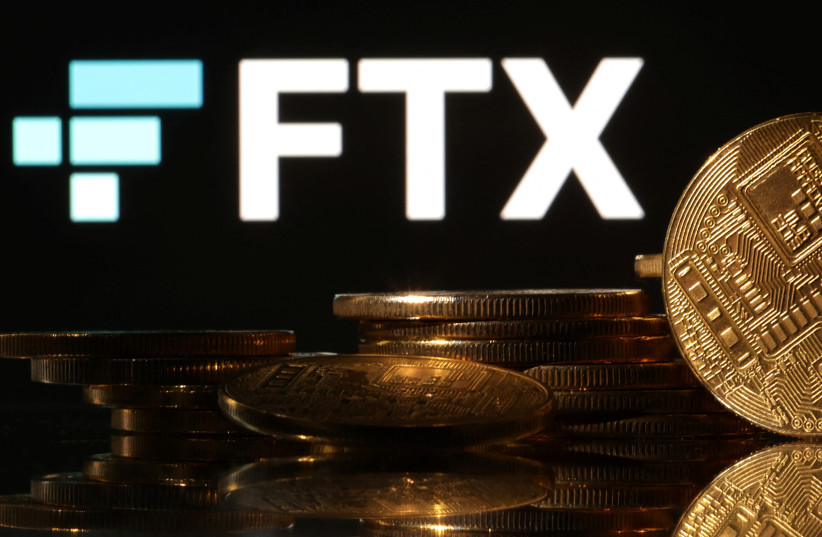  Representations of cryptocurrencies are seen in front of displayed FTX logo in this illustration taken November 10, 2022. (photo credit: REUTERS/DADO RUVIC/ILLUSTRATION)