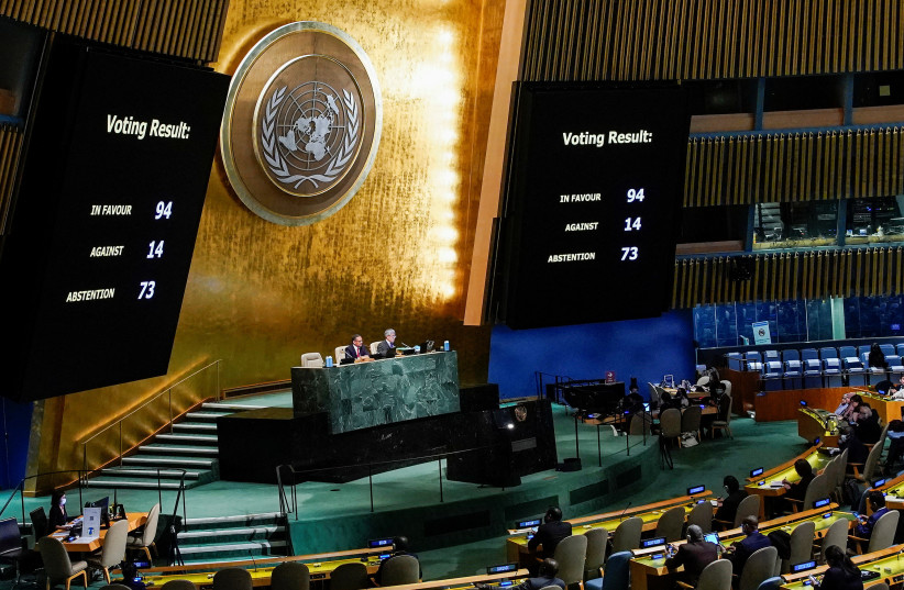  The results of the vote on a resolution recognizing Russia must be responsible for reparation in Ukraine are seen on screen at the United Nations Headquarters in New York, US, November 14, 2022. (photo credit: REUTERS/EDUARDO MUNOZ)