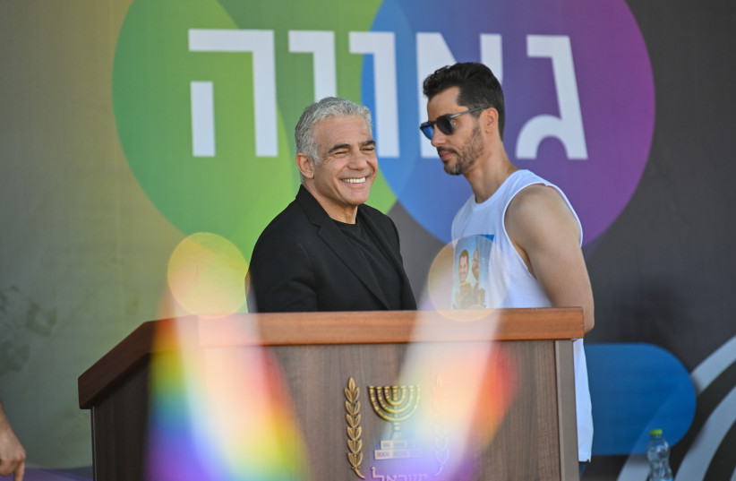  Yair Lapid speaks at the Tel Aviv Pride Parade on June 10, 2022, weeks before becoming Israeli prime minister. His government was Israel's most progressive on LGBTQ issues. (credit: ALEXI ROSENFELD/GETTY IMAGES/JTA)