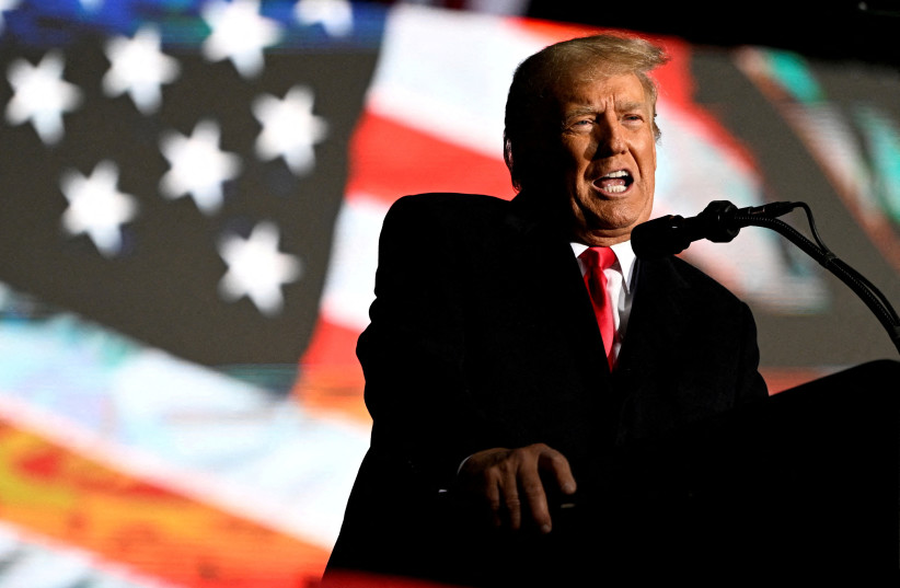 Former US President Donald Trump speaks at a rally to support Republican candidates ahead of midterm elections, in Dayton, Ohio, US November 7, 2022. (photo credit: REUTERS/GAELEN MORSE/FILE PHOTO)