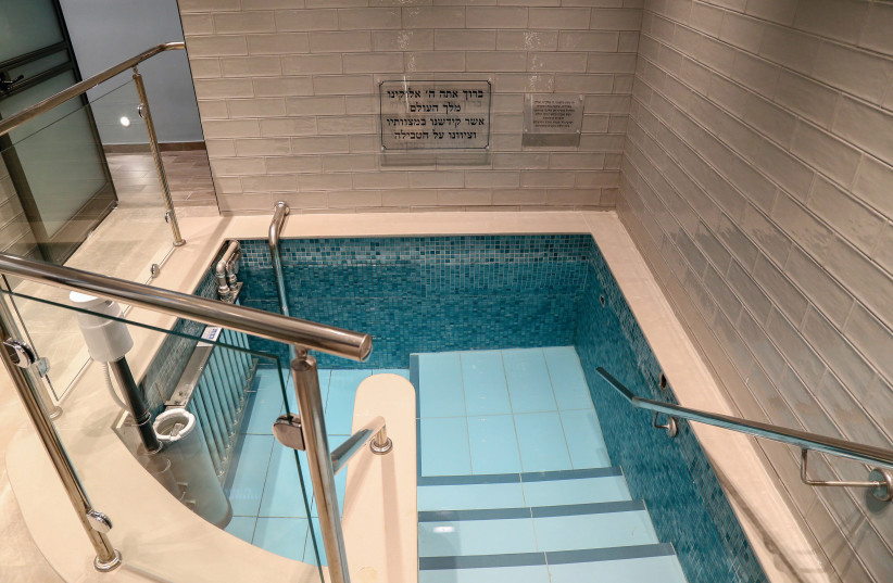   MIKVEH in Efrat: The convert changes completely, declaring to be a new person altogether, keeping all the mitzvot. Just saying a bracha and jumping in the mikveh does not accomplish this sacred task, says the writer (photo credit: GERSHON ELINSON/FLASH90)