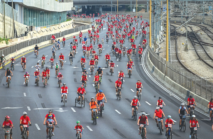  THOUSANDS OF cyclists take part in Israel’s largest cycling event, SOVEV TLV, throughout Tel Aviv, last month (photo credit: AVSHALOM SASSONI/FLASH90)