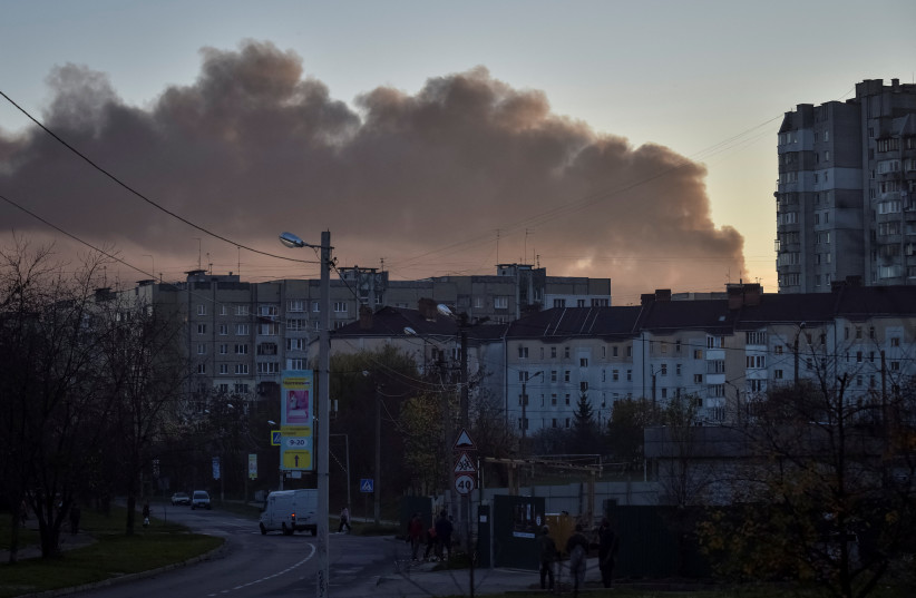 Smoke rises over the city after Russian missile strikes, amid their attack on Ukraine in Lviv November 15, 2022 (credit: Pavlo Palamarchuk/Reuters)