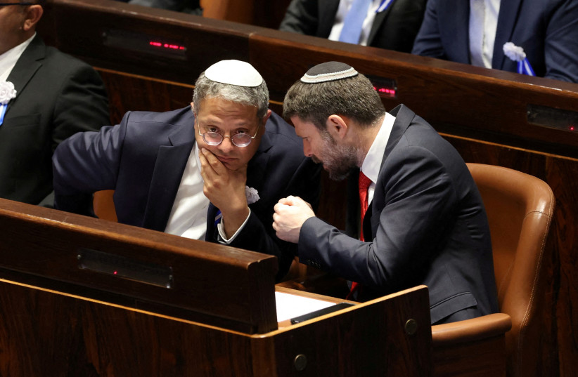  Far-right Israeli lawmakers Itamar Ben Gvir, center, and Bezalel Smotrich, right, attend the swearing-in ceremony for the new Israeli parliament, at the Knesset, or parliament, in Jerusalem, November 15, 2022. (credit: MAYA ALLERUZZO/REUTERS)