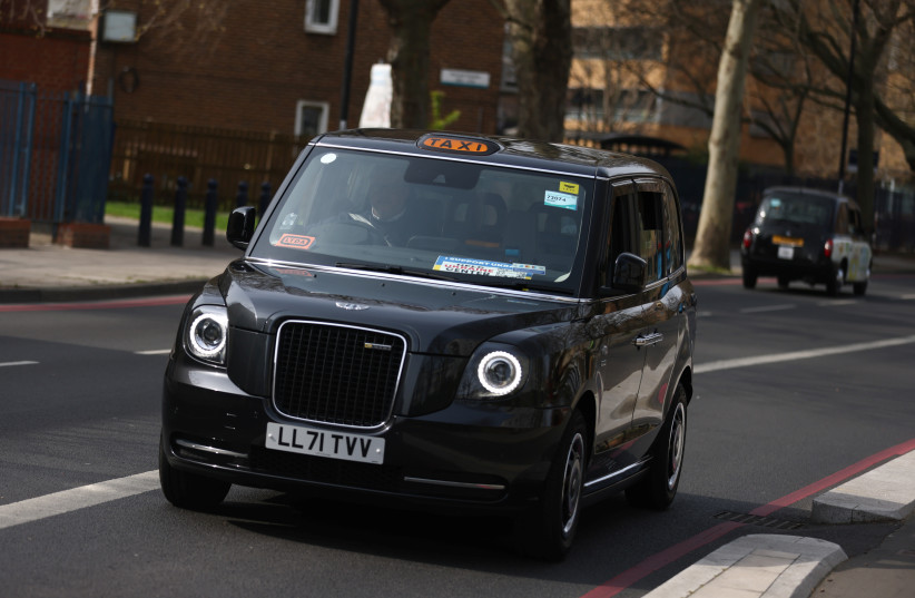  London black cab (illustrative) (credit: REUTERS/TOM NICHOLSON)