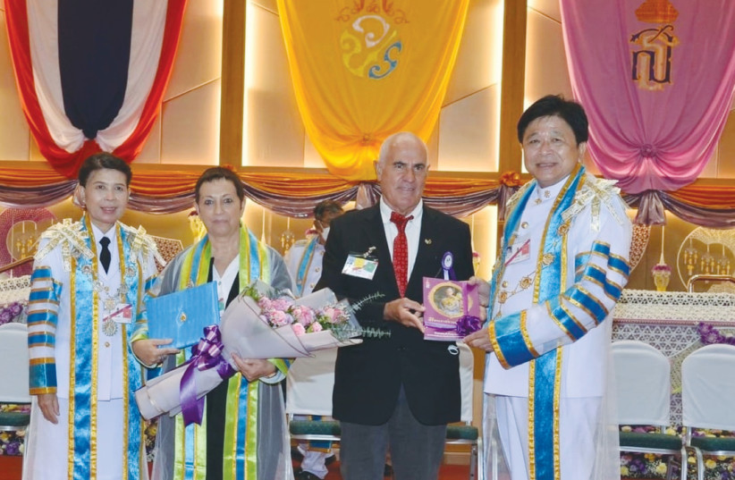  HANNI ARNON (second right) at the award ceremony at the Princess of Naradhiwas University in Thailand. (photo credit: THAI ROYAL FAMILY)