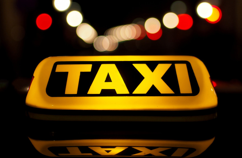  Taxi sign (illustrative) (photo credit: Wikimedia Commons)