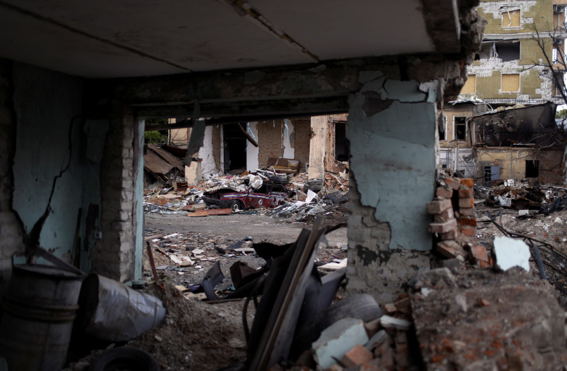 A view of a residential area destroyed by a Russian bombing, amid Russia's attack on Ukraine, in Kharkiv, Ukraine, May 15, 2022. (photo credit: REUTERS/RICARDO MORAES)