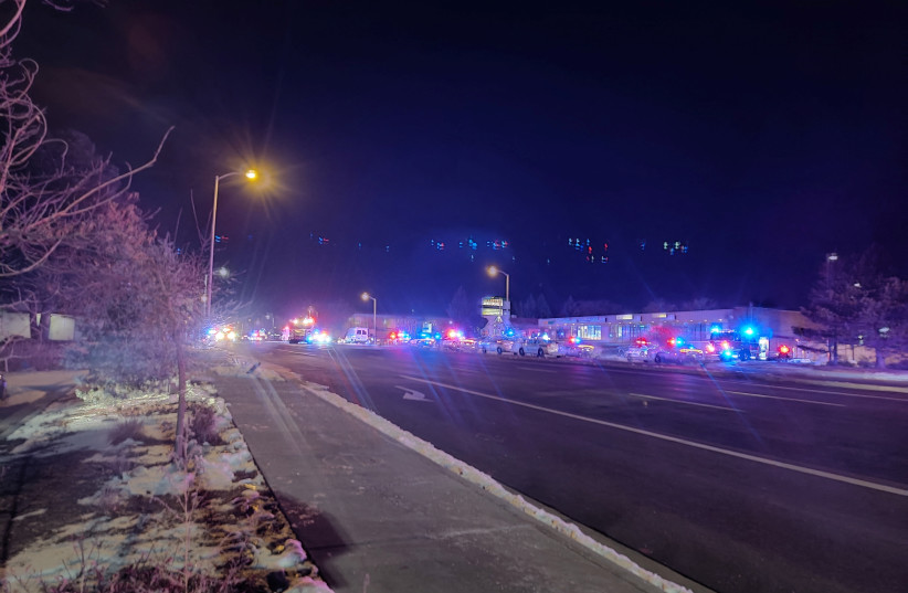  A view of various security and emergency vehicles parked on a street, after a shooting, in Colorado Springs (photo credit: REUTERS)