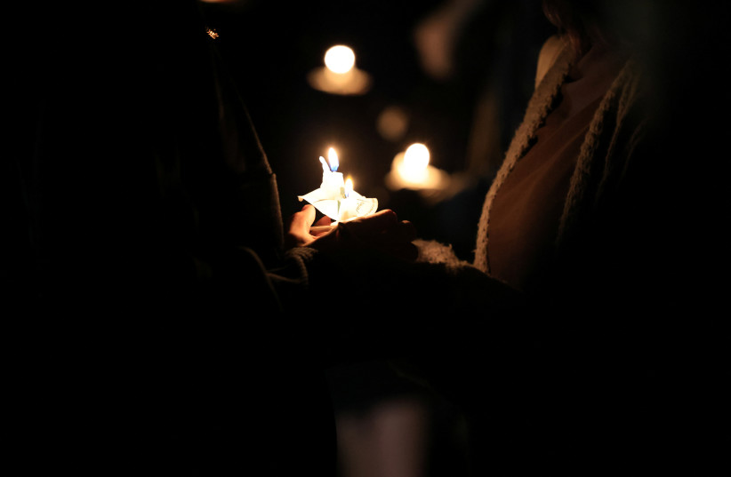  People attend a vigil after a mass shooting at the Club Q gay nightclub in Colorado Springs, Colorado, U.S., November 20, 2022 (credit: REUTERS/KEVIN MOHATT)