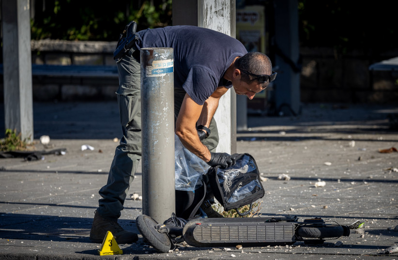  The scene of a suspected terror attack near the entrance to Jerusalem, on November 23, 2022. Two explosions at two bus stops left one person killed and at least another 13 injured.  (photo credit: YONATAN SINDEL/FLASH90)