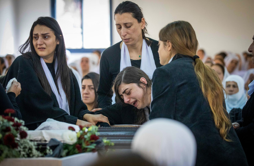  Family and friends mourn during the funeral procession of Tiran Fero, an israeli teenager whose body was kidnapped from a hospital in Jenin by palestinian gunmen and returned to Israel tonight, in Daliyat al-Karmel, northern Israel, November 24, 2022 (photo credit: SHIR TOREM/FLASH90)