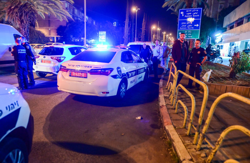  Police at the scene where a man killed after being stabbed during a road rage incident in Holon, on November 23, 2022 (photo credit: AVSHALOM SASSONI/FLASH90)