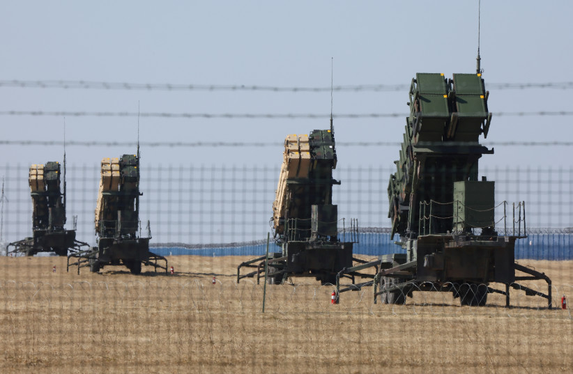US Army MIM-104 Patriots, surface-to-air missile (SAM) system launchers, are pictured at Rzeszow-Jasionka Airport, amid Russia's invasion of Ukraine, Poland March 24, 2022. (photo credit: REUTERS/STRINGER)