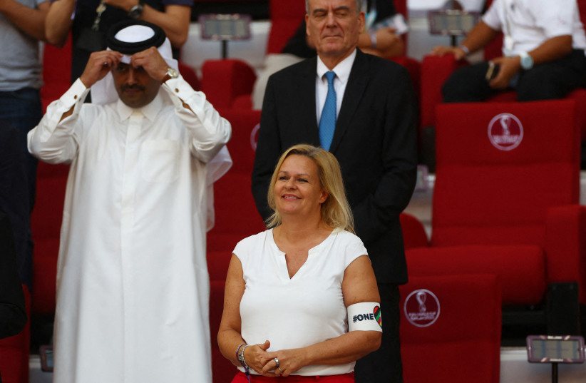  German Interior Minister Nancy Faeser is seen wearing the OneLove armband in Khalifa International Stadium, Doha, Qatar, on November 23, 2022. (credit: REUTERS/KAI PFAFFENBACH)