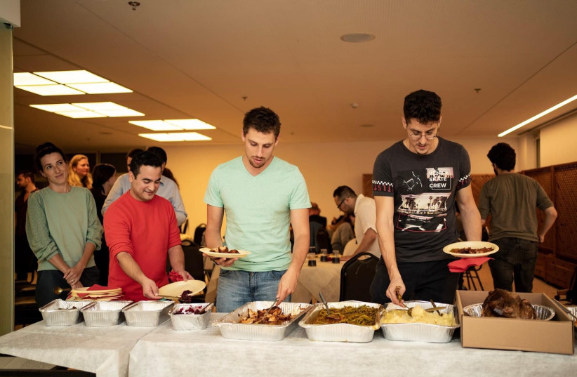  A buffet of traditional dishes is served for Thanksgiving 2021 at Kerem House in Tel Aviv (photo credit: KEREM HOUSE)