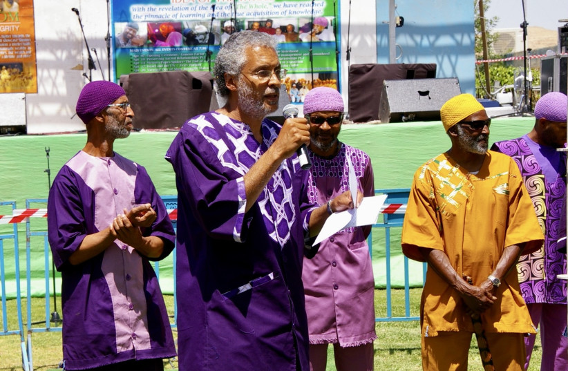  Sar ("Minister") Ahmadiel Ben Yehuda speaks at the African Hebrew Israelites' annual New World Passover celebration in Dimona, Israel, May 2013.  (photo credit: ANDREW ESENTSEN/JTA)