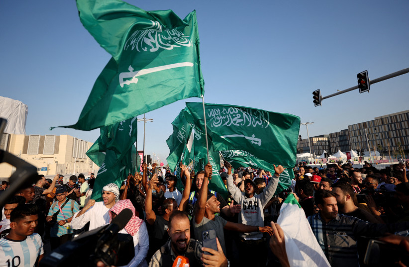  Saudi Arabia fans celebrate outside the stadium after the match with Argentina, November 22, 2022. (photo credit: REUTERS/AMR ABDALLAH DALSH)