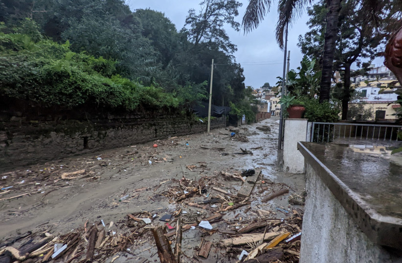  Debris are seen on the street, following a landslide on the Italian holiday island of Ischia, Italy, in this handout photo obtained by Reuters on November 26, 2022. (photo credit: Carabinieri/Handout via REUTERS)