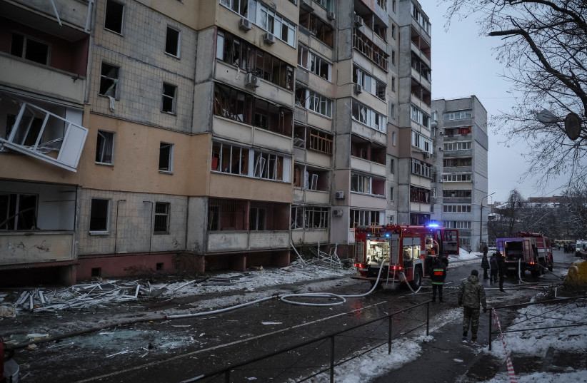  Rescuers work at a site of a residential building destroyed by a Russian missile attack, as Russia's attack on Ukraine continues, in the town of Vyshhorod, near Kyiv, Ukraine November 23, 2022. (credit: REUTERS/GLEB GARANICH)