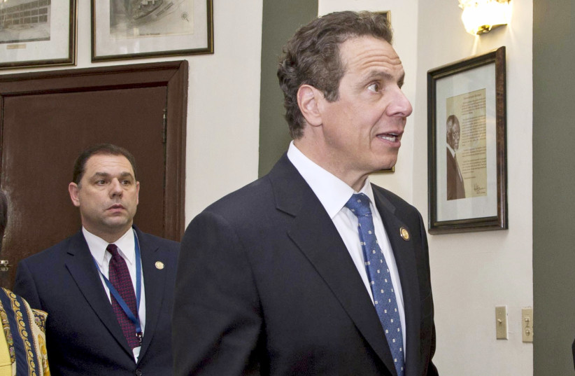  New York Governor Andrew Cuomo (R), walks with his aide Joseph Percoco (L) in the Hall of Fame before meetings at the Hotel Nacional in Havana, Cuba, on April 20, 2015. (credit: REUTERS/Ramon Espinosa/Pool/File Photo)