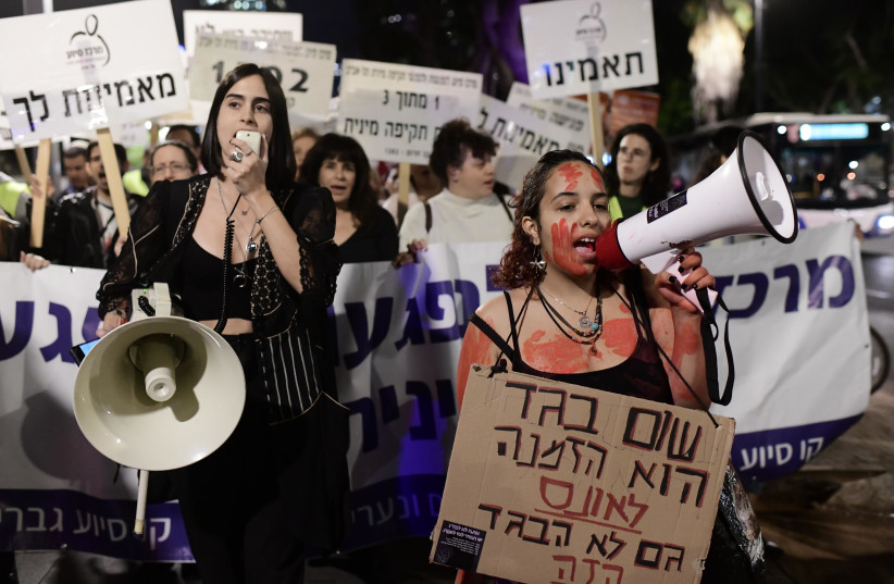  People take part in a protest march as part of International Day for the Elimination of Violence against Women in Tel Aviv, November 24, 2022.  (credit: TOMER NEUBERG/FLASH90)