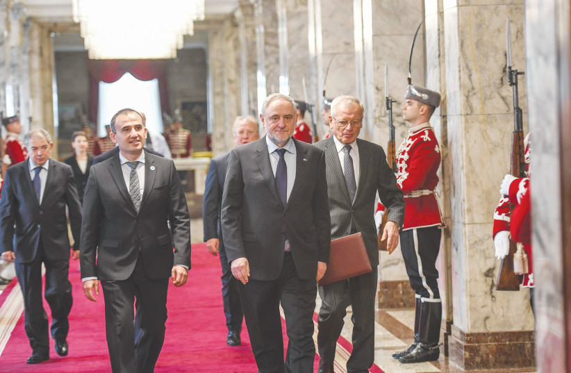 The writer walks with the head of the Bulgarian Jewish community, Prof. Alek Oscar, on their way to a meeting with the president of Bulgaria. (photo credit: SHAHAR AZRAN)