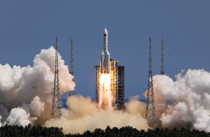 A Long March-5B Y3 rocket, carrying the Wentian lab module for China's space station under construction, takes off from Wenchang Spacecraft Launch Site in Hainan province, China, July 24, 2022. (photo credit: CHINA DAILY VIA REUTERS)