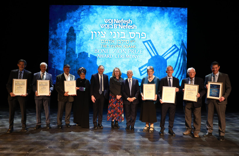  Sylvan Adams Nefesh B'Nefesh Bonei Zion award winners, with NBN co-founders Tony Gelbart and Rabbi Yehoshua Fass and Margaret Adams. (credit: YONIT SCHILLER)