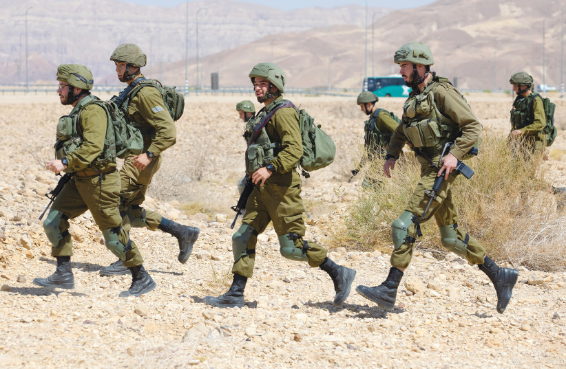  IDF SOLDIERS in training during an exercise. A logical conclusion is that America hates a powerful Israel, says the writer. (photo credit: MOSHE SHAI/FLASH90)