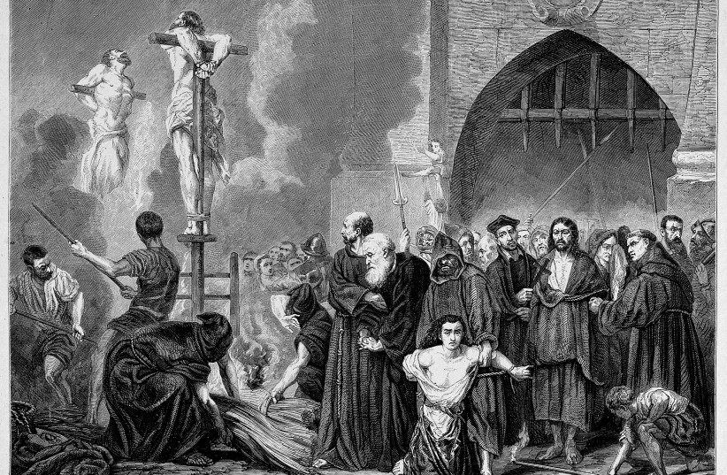  Jews who refused to convert or leave Spain during the Inquisition were called heretics and could be burned to death on a stake. Wood engraving by Bocort after H.D. Linton. (credit: WIKIPEDIA)