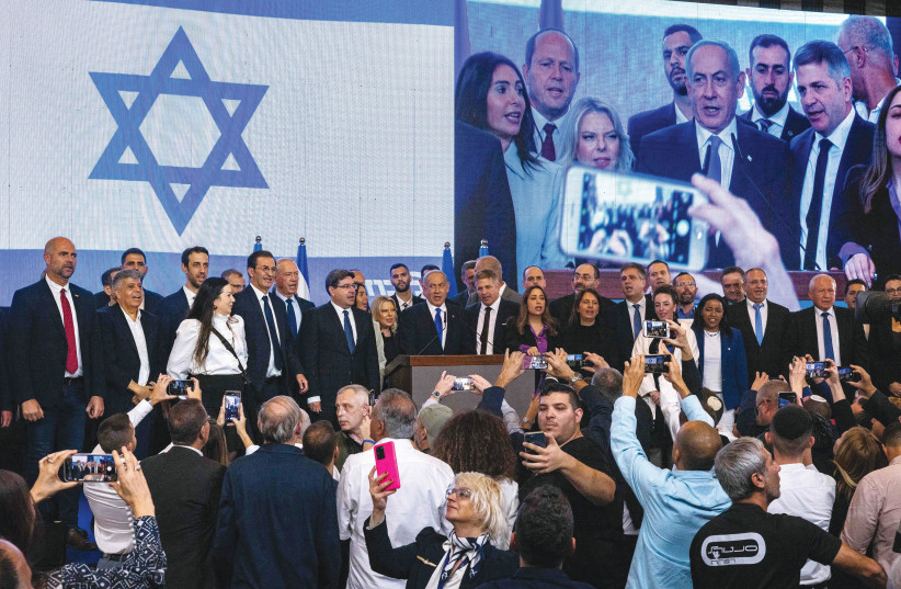  LIKUD CHAIRMAN Benjamin Netanyahu celebrates together with party MKs on election night. How many of them will be overlooked for ministries?  (photo credit: OLIVIER FITOUSSI/FLASH90)